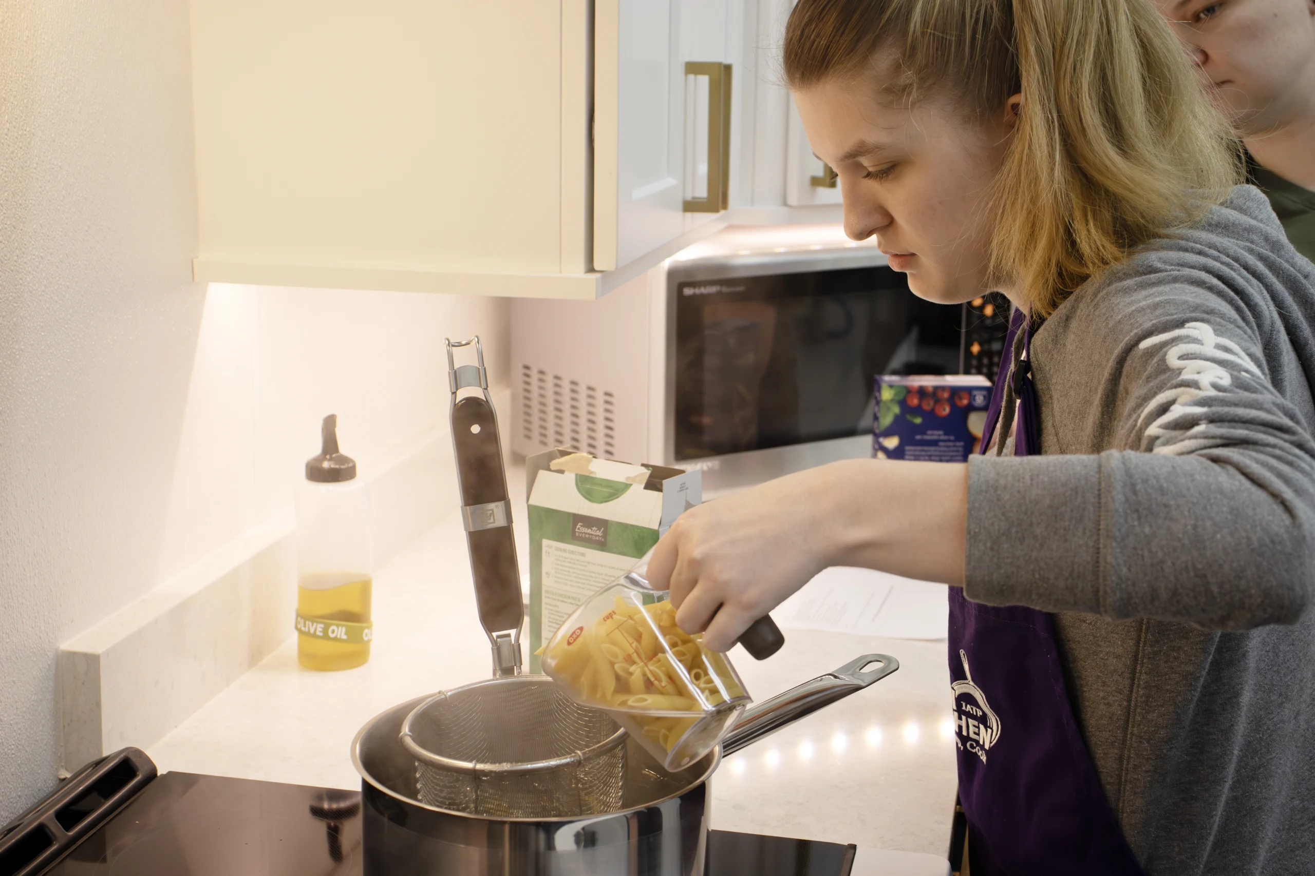 IATP Customer Uisng a Measuring Cup